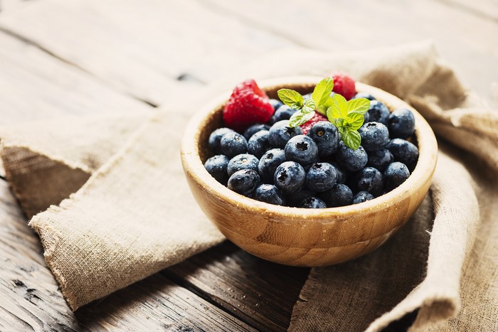 Blueberries and Strawberries in a Wooden Bowl