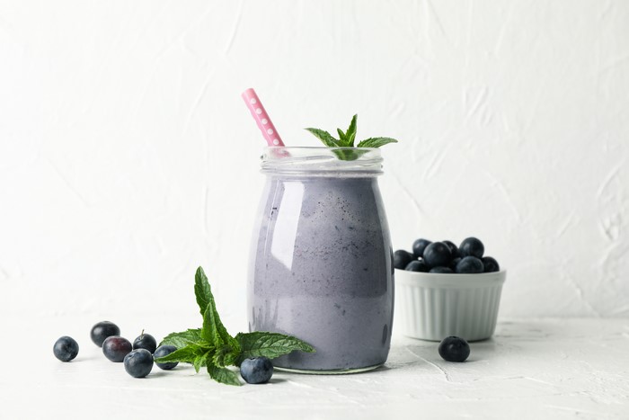 Blueberry Smoothie in a Jar with Fresh Blueberries and Mint