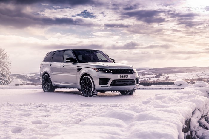 White Range Rover Sport HST in Snow