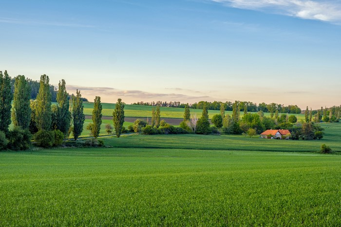 Bohemian landscape with fields and houses in Czech Republic