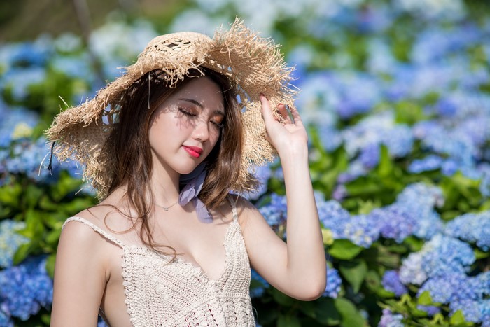 4K Portrait of Asian Woman Wearing Hat