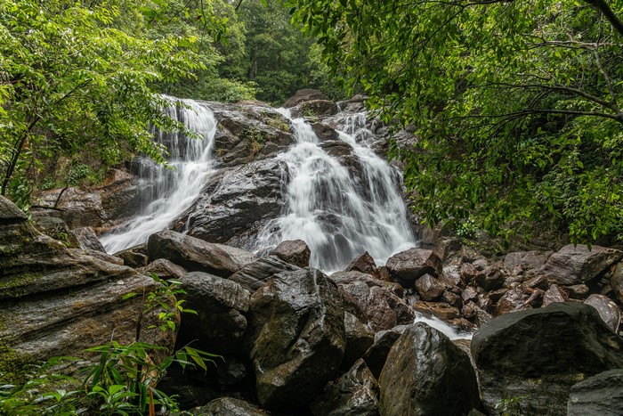 4K Waterfall with Rocks and Greenery