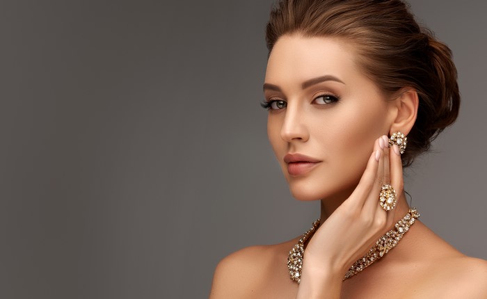Woman with Jewelry, Earrings, and Ring