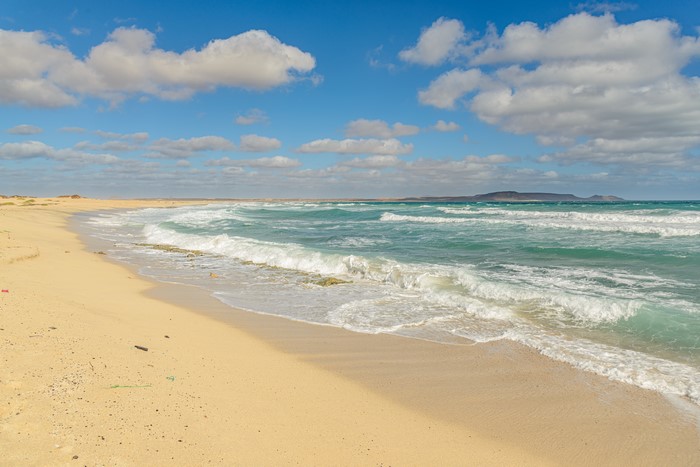 Beach with Waves and Clouds