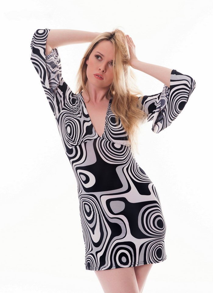 Carla Monaco in a patterned dress