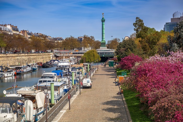 Paris Waterfront with Boats and Bastille Column