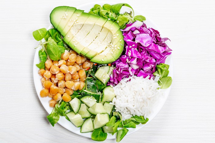 Buddha Bowl with Rice, Avocado, Chickpeas, and Vegetables