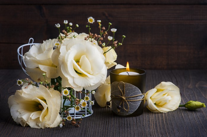 White Eustoma Flowers and Candle