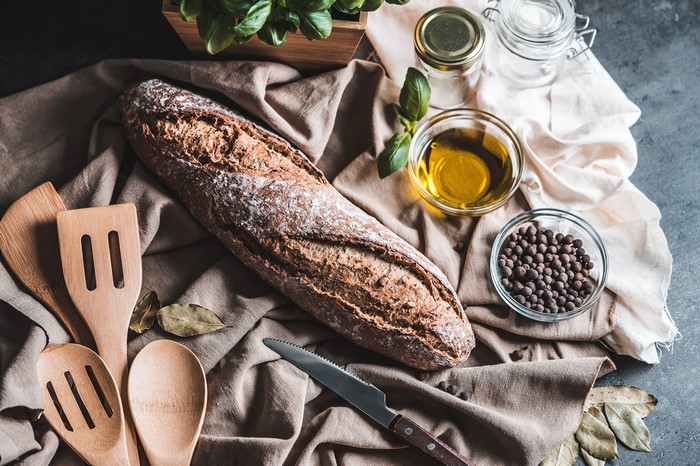 Bread, Knife, Black Pepper, Olive Oil, and Basil