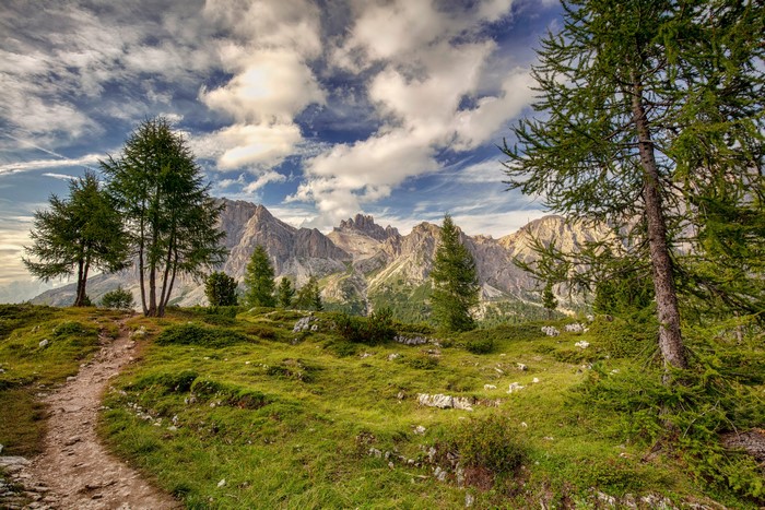 Trail through Dolomites mountains in Italy