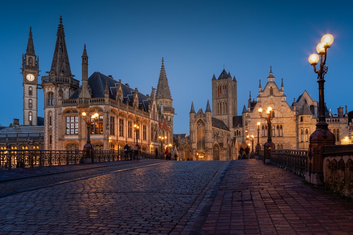 Ghent, Belgium at Dusk with Historic Buildings and Bridge