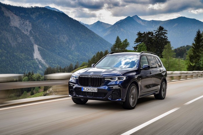BMW X7 G07 driving on a mountain road