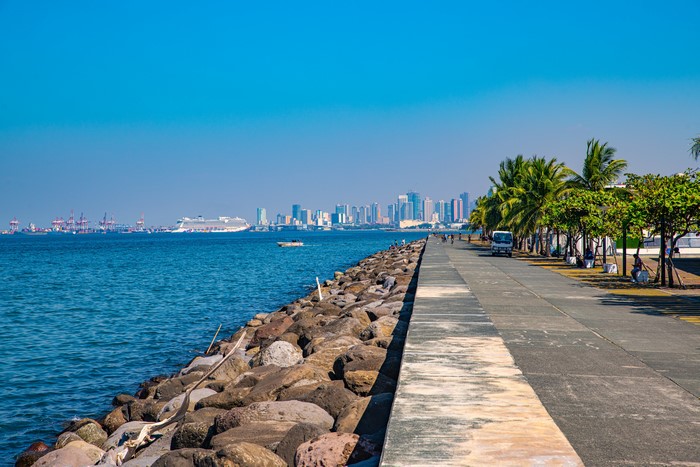 Manila Bay Waterfront with City Skyline and Cruise Ship