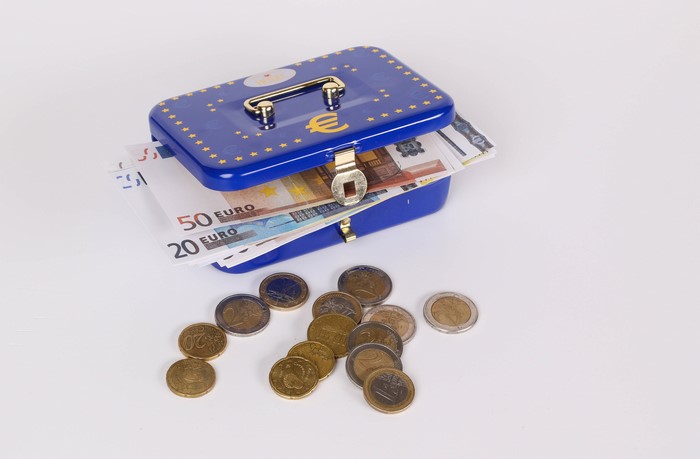 Blue cash box with Euro banknotes and coins