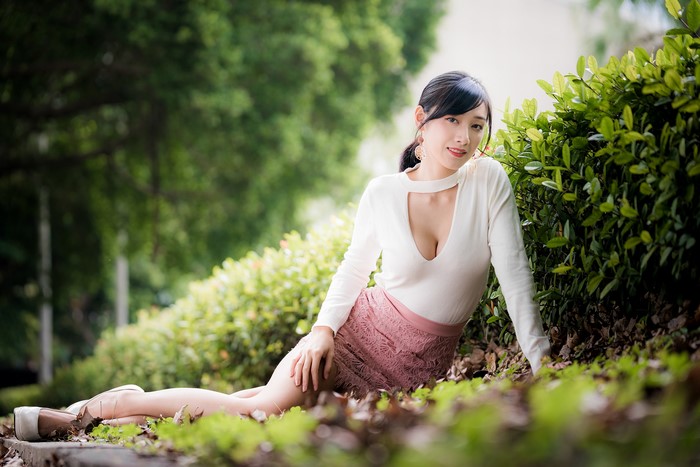 4K Asian Woman Sitting in Garden