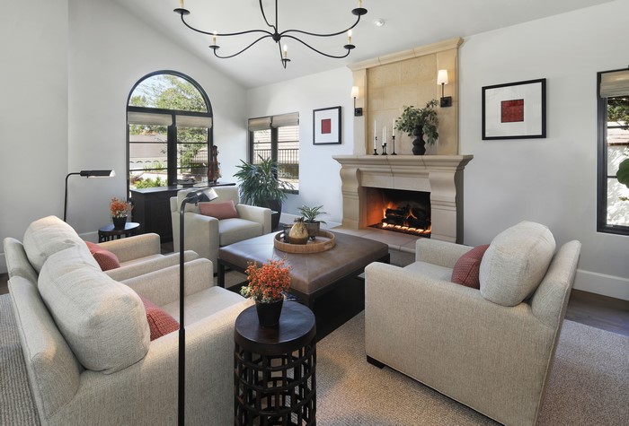 Living room with fireplace and armchairs