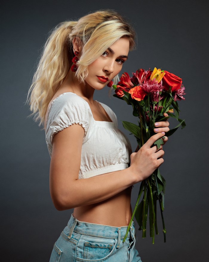 Jenny with a bouquet of flowers