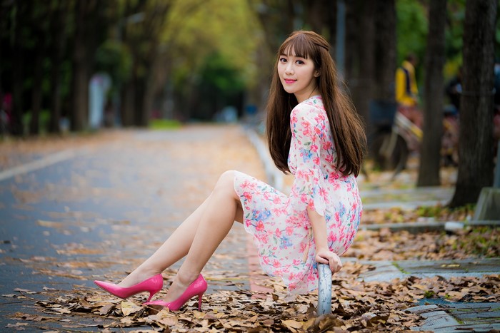 4K Autumn Scene with Asian Woman in Dress