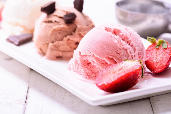 Ice cream scoops with strawberries and chocolate