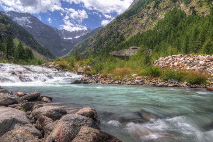 River flowing through mountains in Gran Paradiso National Park, Italy