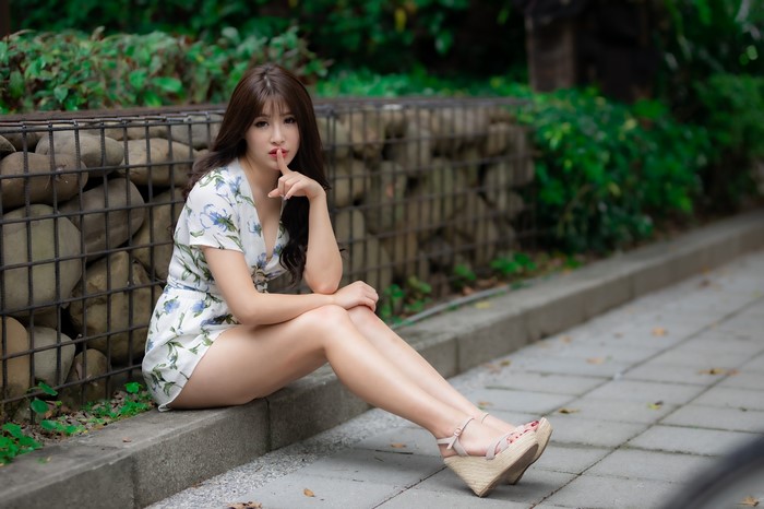 4K Asian Woman Sitting in Floral Dress