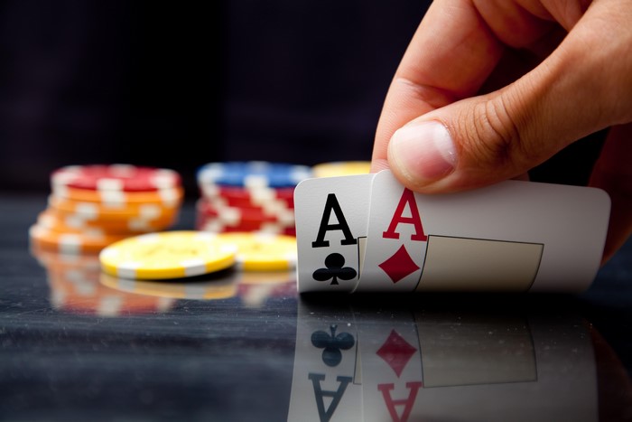Two Aces in a Poker Game with Casino Tokens