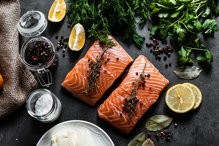 Salmon fillets with lemons, herbs, and spices