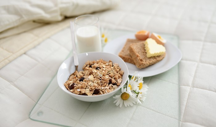 Breakfast with Muesli, Toast, Egg, and Milk