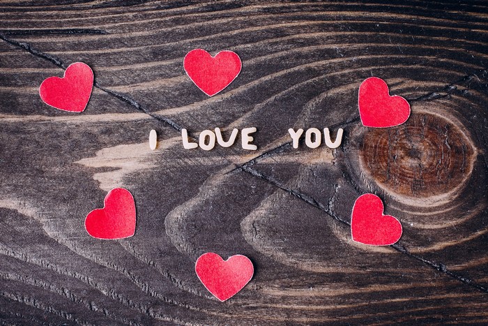 I Love You with red hearts on wood