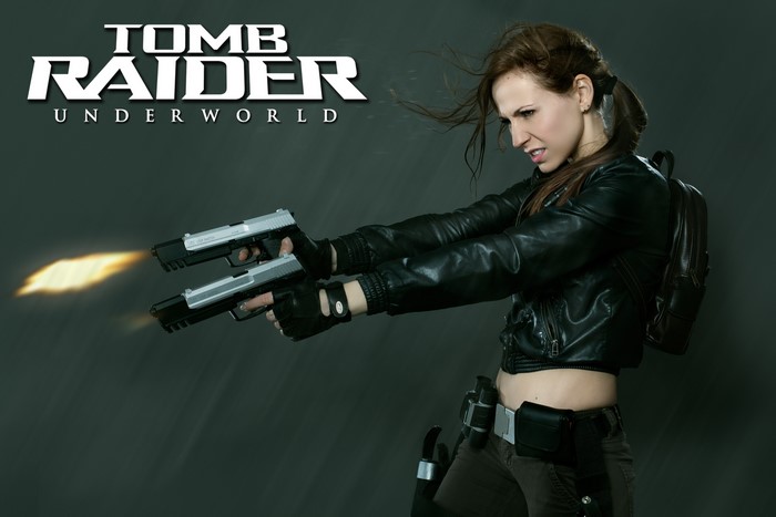 Lara Croft from Tomb Raider Underworld firing pistols