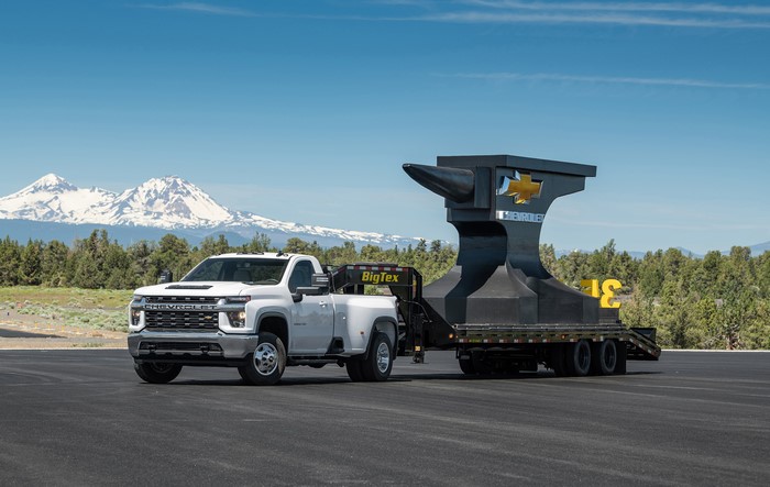 White 2020 Chevrolet Silverado 3500 Regular Cab Truck Towing Anvil Trailer