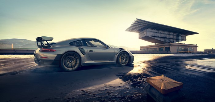 Silver Porsche 911 GT2 RS on a rooftop