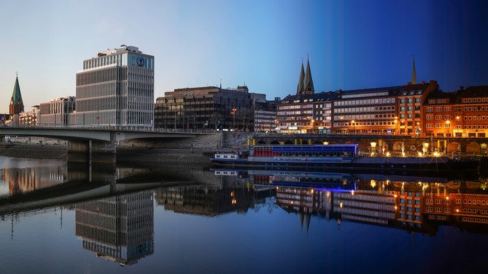 Bremen, Germany: River and Cityscape at Dusk