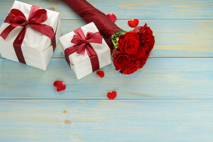 Gifts and Roses on Wood Planks