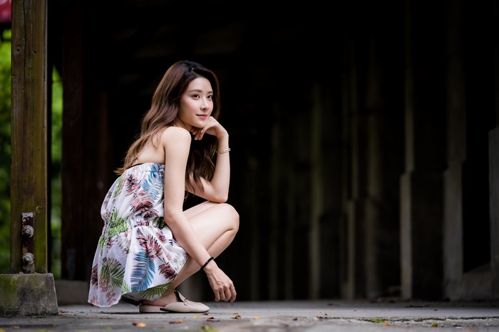 4K Asian Woman Sitting with Thoughtful Glance
