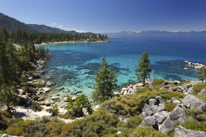 Lake Tahoe with Kayakers and Rocky Shoreline