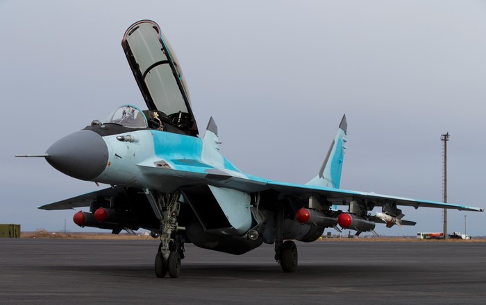 Mikoyan MiG-35 fighter jet with missiles on tarmac
