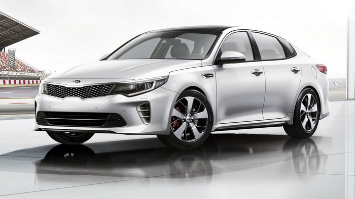 Silver KIA Optima Sedan on a Racetrack