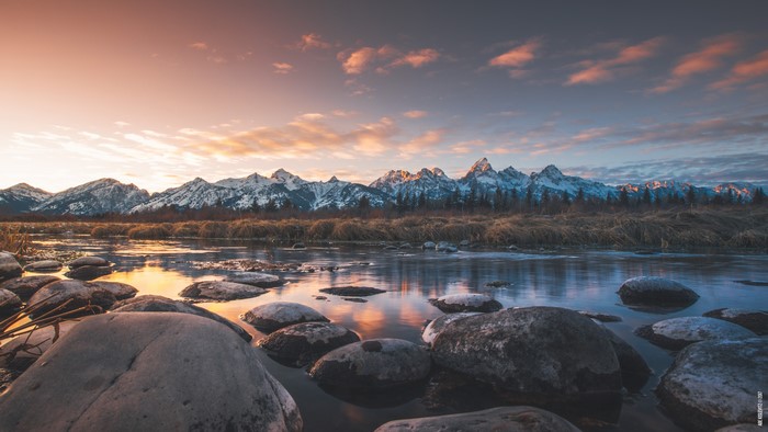 Grand Teton National Park at sunset with river and mountains