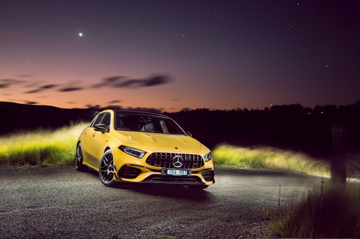 Yellow Mercedes-Benz AMG A 45 S 4MATIC Aerodynamic Package at night