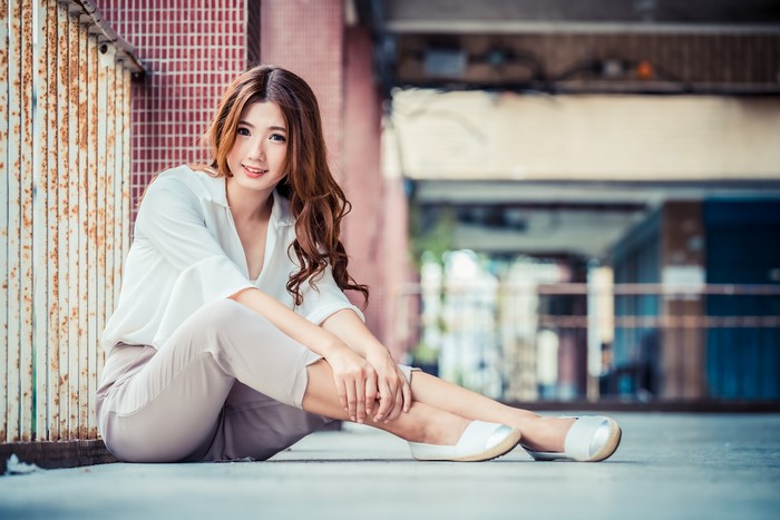 4K Asian Woman Sitting with Bokeh