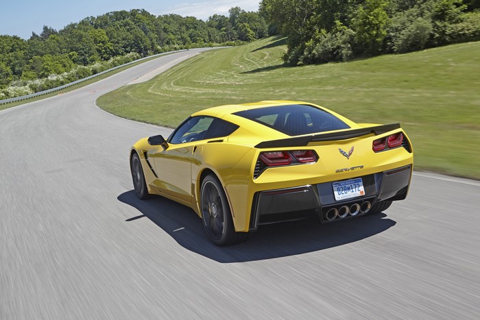 Yellow Chevrolet Corvette C7 Stingray on a Racetrack
