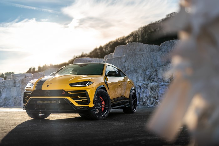 Yellow Manhart Lamborghini Urus SSUV with Black Stripes