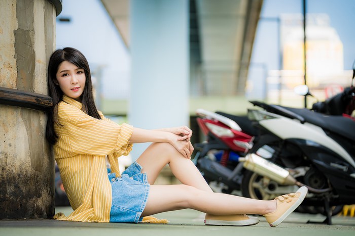 4K Asian Brunette Girl Sitting with Skirt