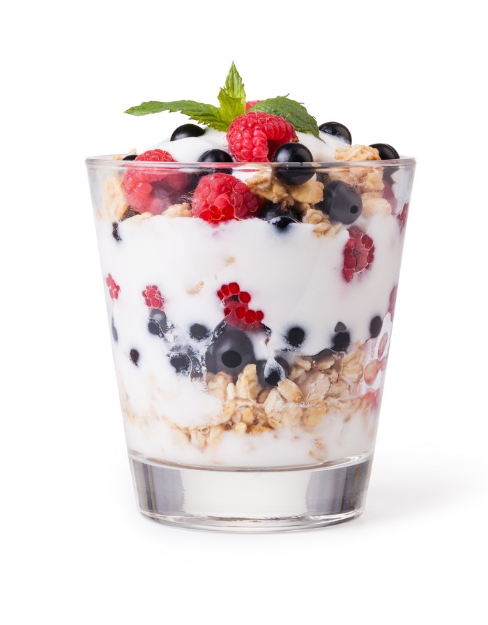 Yogurt parfait with berries and granola in a glass
