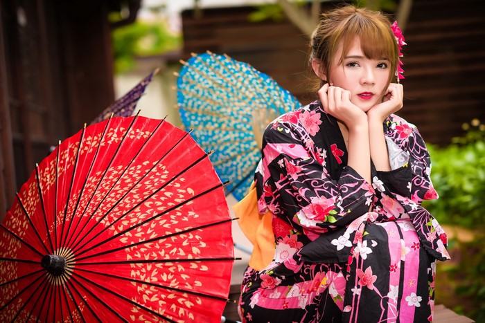 Woman in Kimono with Umbrellas