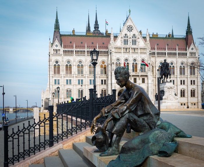 Attila Jozsef sculpture in front of Hungarian Parliament Building, Budapest