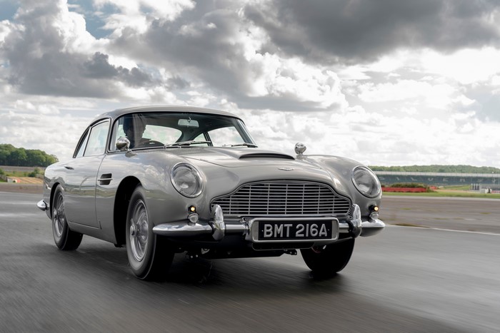 Aston Martin DB5 Goldfinger Continuation car on a road