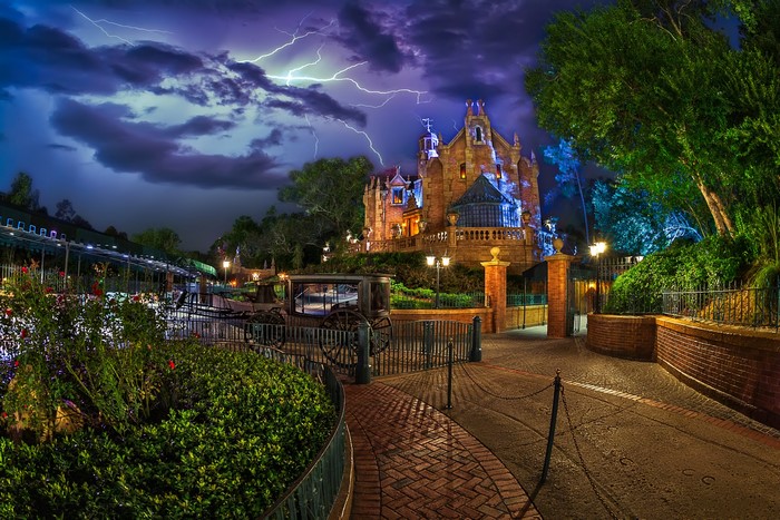 Haunted Mansion at night with lightning in Disneyland