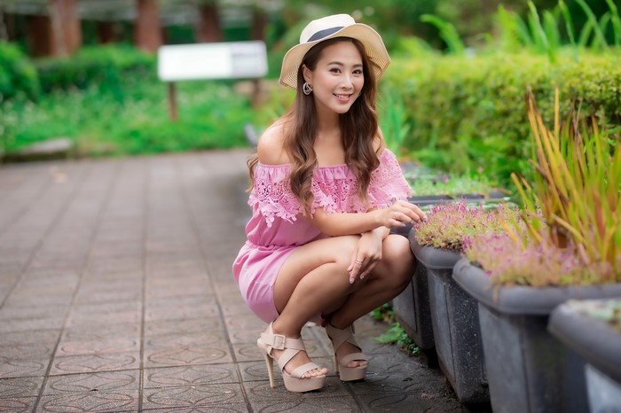 4K Asian Woman Wearing Hat and Pink Dress